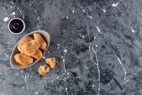 coissants on marble countertop